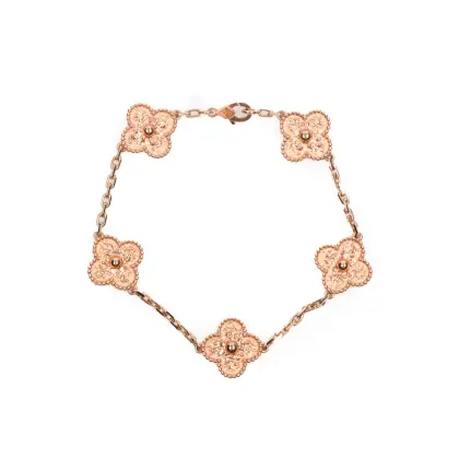 VAN CLEEF & ARPELS BRAZALETE EN ORO ROSADO.